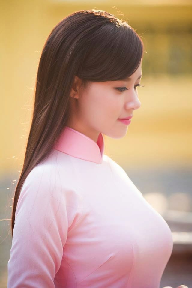 Midu với áo dài thướt tha